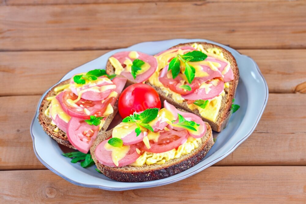 Hot Sandwiches with Sausage, Mayonnaise, and Cheese in the Oven