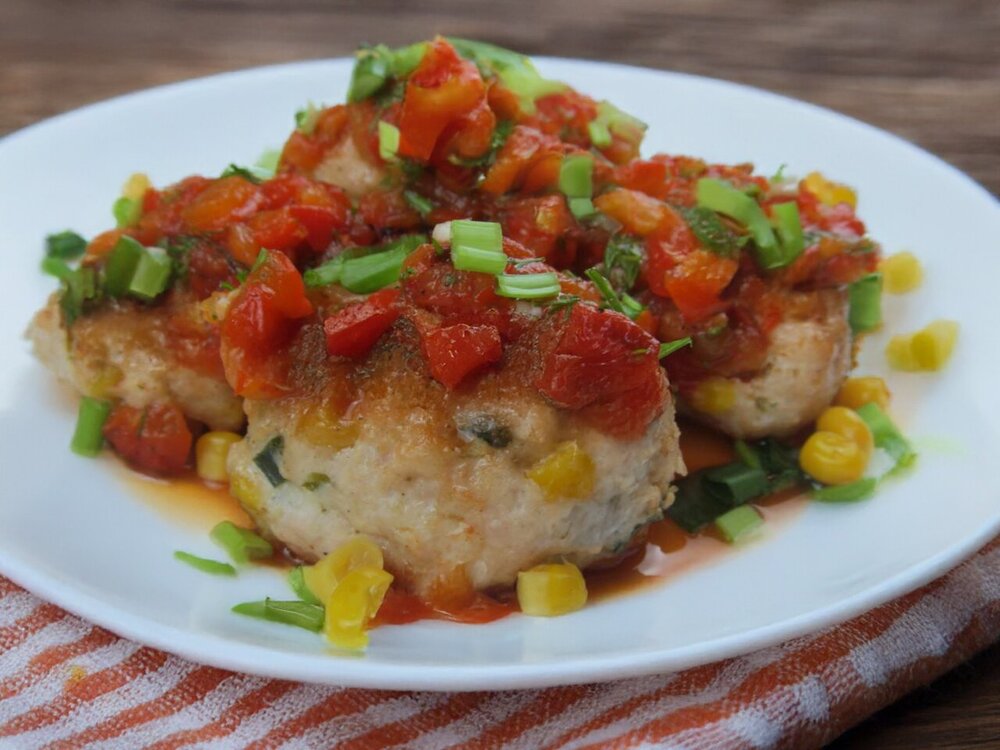 Turkey patties with corn and sauce