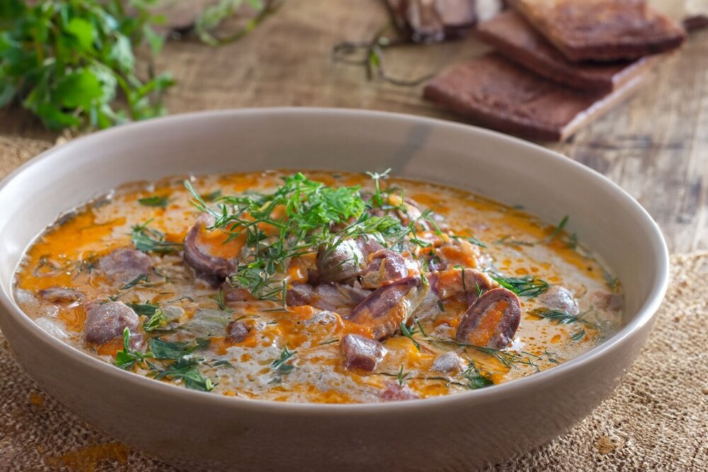 Stewed Chicken Hearts with Carrots and Onions in Sour Cream
